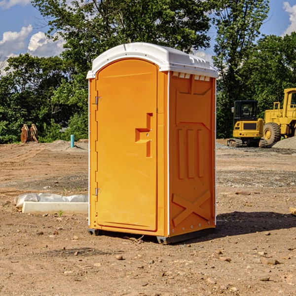 how often are the portable restrooms cleaned and serviced during a rental period in Harcourt